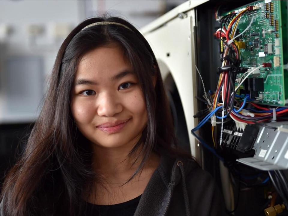 A smiling researcher. 