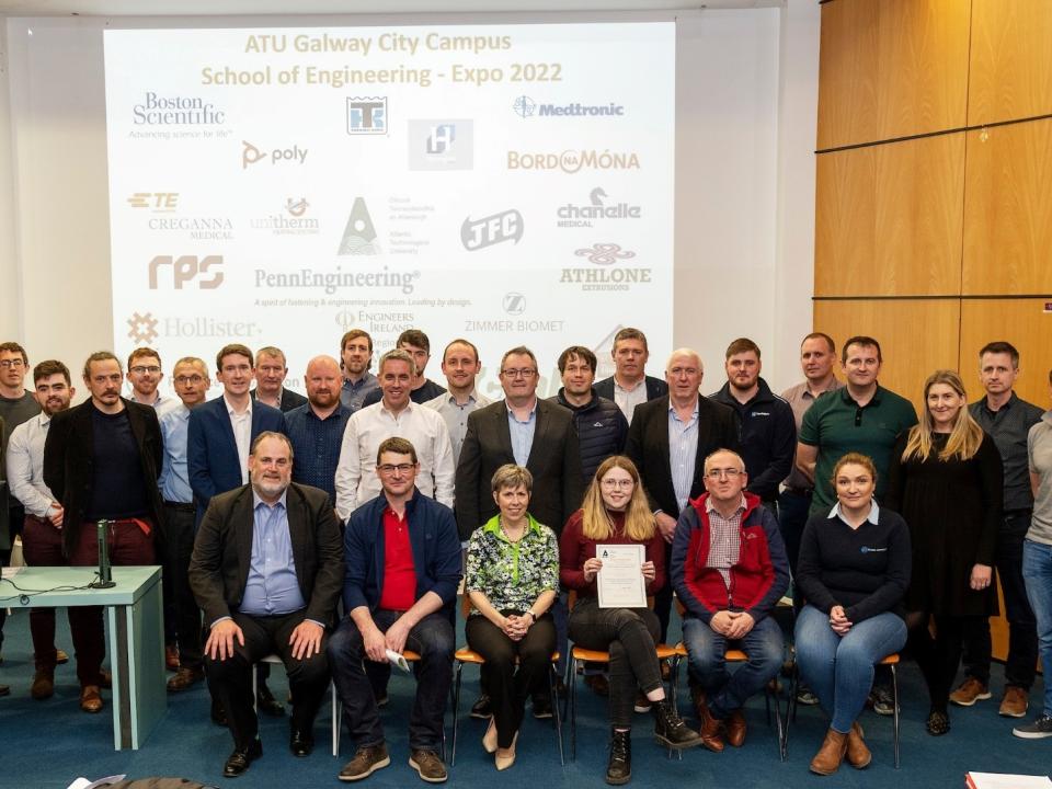 <p><strong>Standing, L to R: John Butler, Operations Manager, Bord na Mona; Tom Larkin, Engineering Manager, Zimmer Biomet; Liam Murry, Mechanical Project Engineer, DoConnor Ltd; Nicholas Burke, Senior Engineer, RPS Group; Michael Stankard, Mechanical Project Engineer, DoConnor Ltd; Neil VanMaanen, Design Manager, Bord na Mona; Richard Manton, Associate Director, Engineers Ireland; Liam Collins, CEO, Collins  Plastics; Shane Kelly, Director, Unitherm, William Finnegan, Chartered Engineer, Engineers Ireland West; Alan Heneghan, Production Unit Manager, Boston Scientific; Pierre Kerhascoet, Project Manager, Irish Bioeconomy Foundation; Dylan Farrell, Mechanical Engineer, Thermo King; John O’Brien, Senior Engineer, Penn Engineering; Noel Riordain, Project Engineer, Boston Scientific; Donal Collins, R&D Manager, McHale; Eugene Murphy, Maintenance Manager, Athlone Extrusions; Francis Barron, Design Engineer, Harrington Concrete; Gerard Noone, Design Engineer, JFC; Joseph Goggins, Director of Engineering, Poly; Laura Beatty, Snr Talent Acquisition Manager, Medtronic; Dermot O’Reilly, R&D Senior Manager, Crannmed; and Liam Ruddy, Mechanical Engineer, TE Connectivity. <br />
Seated, L to R: Professor Graham Heaslip, Head of School of Engineering; Dr Oliver Mulryan, Head of Department, Mechanical and Industrial Engineering; Dr Orla Flynn, President ATU; Aine Kane, Overall Poster competition winner; Dr Denis O’Mahoney, Supervisor; and  Emma Lacy, Marketing and Business Development Manager, Reliance Automation.[Missing from photo is Declan Long, Snr Project Engineer, Mechanical, Hollister].</strong></p>
