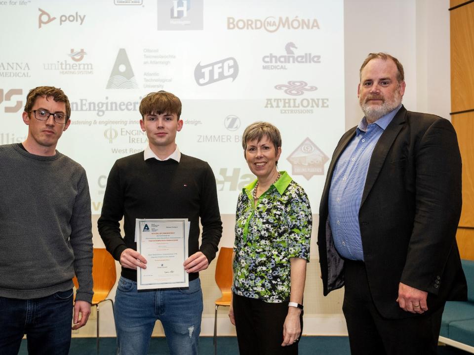 <p>Tom Larkin, Engineering Manager, Zimmer Biomet; student Aidan Doohan, Dunmore, Co Galway, Biomedical Engineering poster competition winner; Dr Orla Flynn, President of ATU; and Professor Graham Heaslip, Head of the Engineering School.</p>
