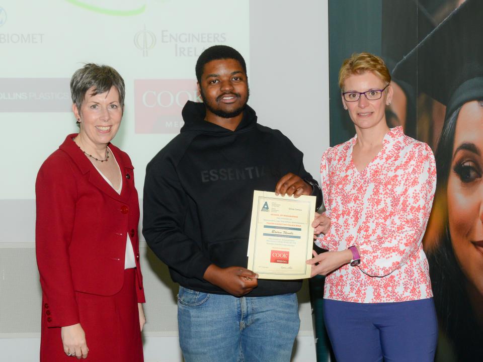 <p>Mechanical Engineering – Manufacturing Stream Competition Winner <br />
L to R: Dr Orla Flynn, President of ATU; Brian Ncube, Mechanical Engineering – Manufacturing Specialisation, Poster Competition Award recipient; and Dr Carine Gachon, Transcend Project Manager, representing Jennifer Rice, Manager, Human Resources, Cook Medical.<br />
 </p>
